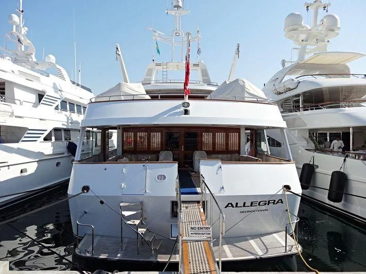 a group of boats are parked in a harbor aboard ALLEGRA Yacht for Sale