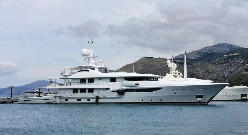 a large white yacht in the water aboard ARIELA Yacht for Sale