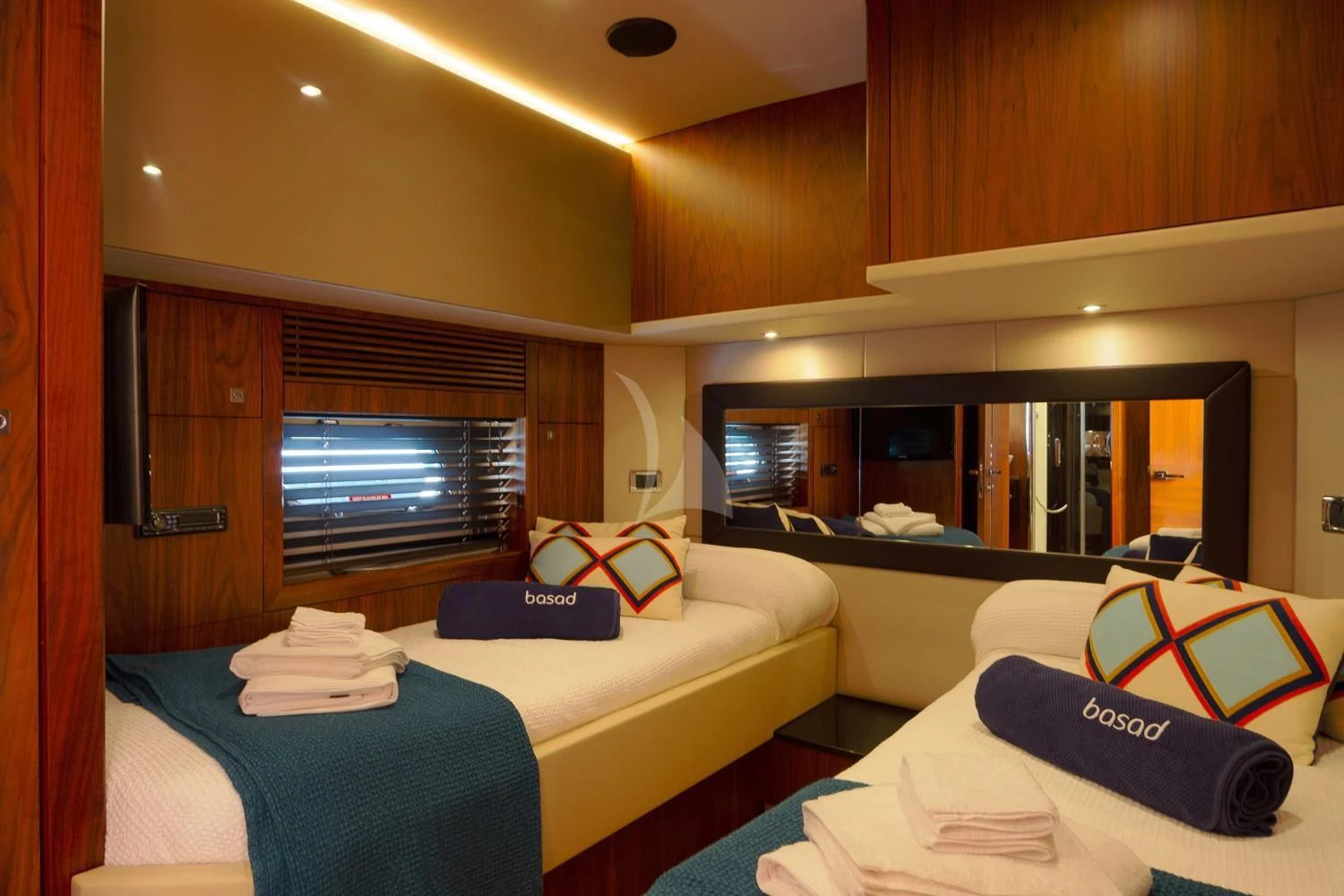 a room with a bed and a television aboard BASAD Yacht for Sale