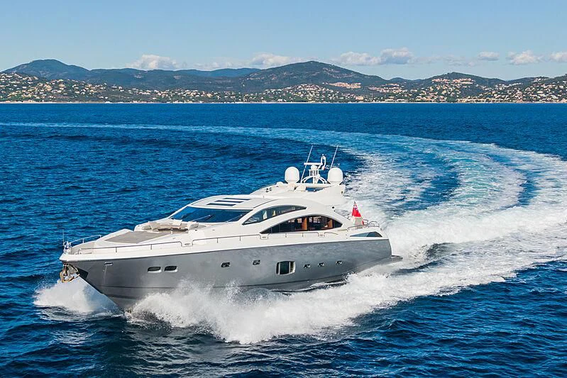 a white yacht on the water aboard BASAD Yacht for Sale