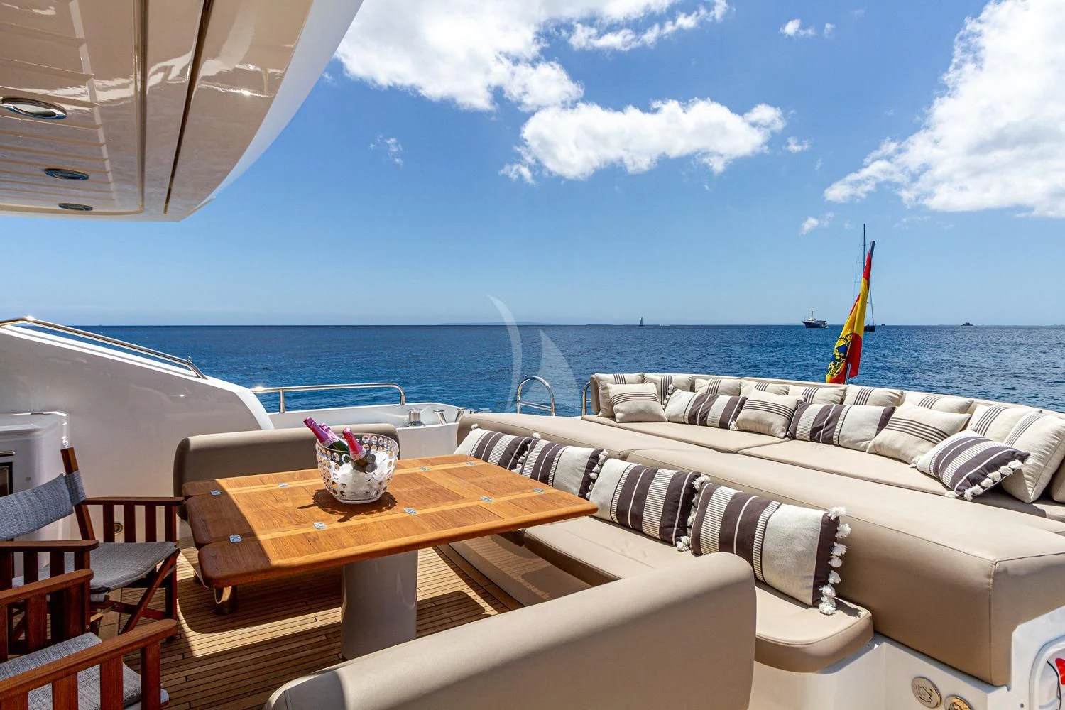 a table and chairs on a boat aboard BASAD Yacht for Sale