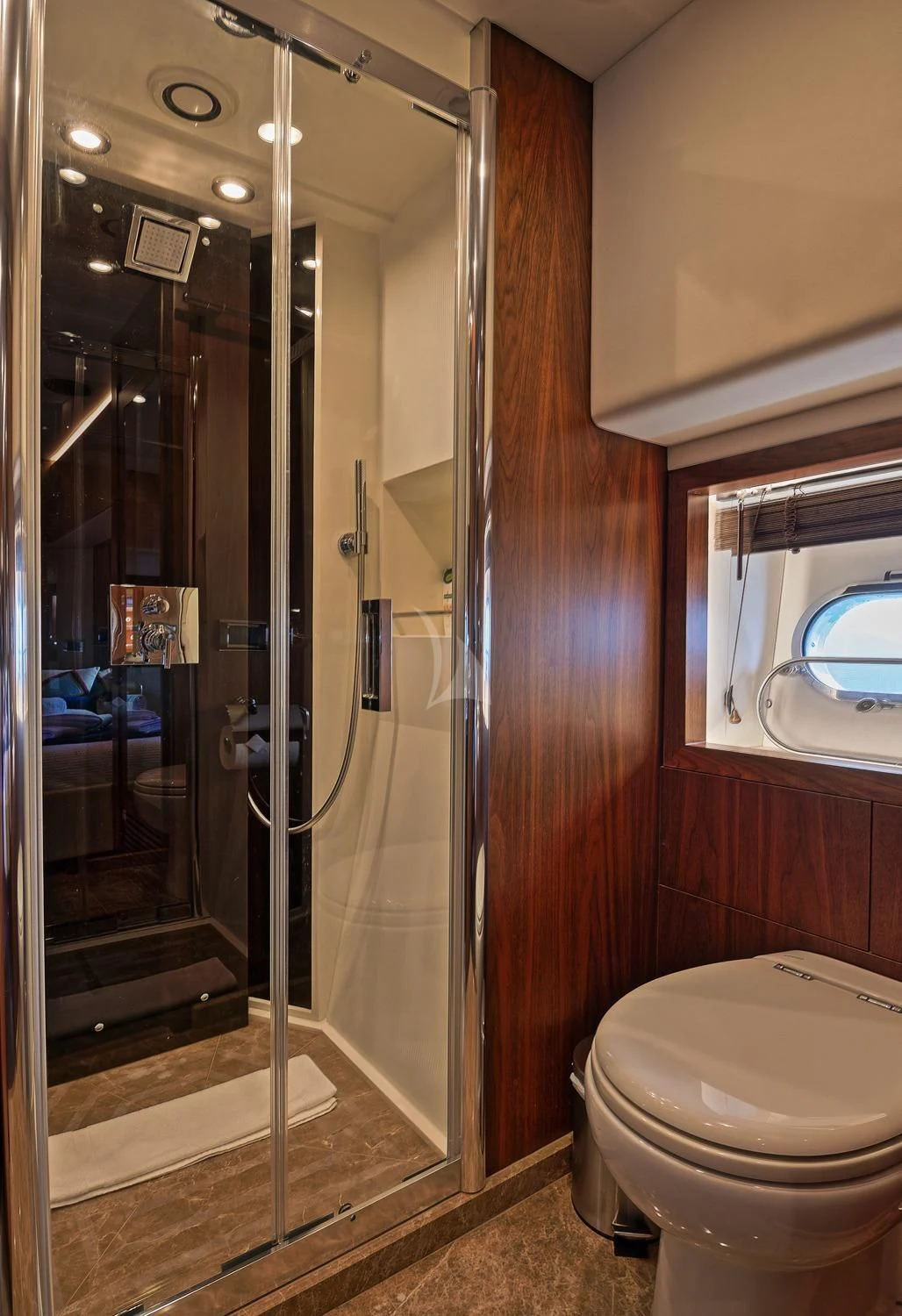 a bathroom with a glass shower aboard BASAD Yacht for Sale