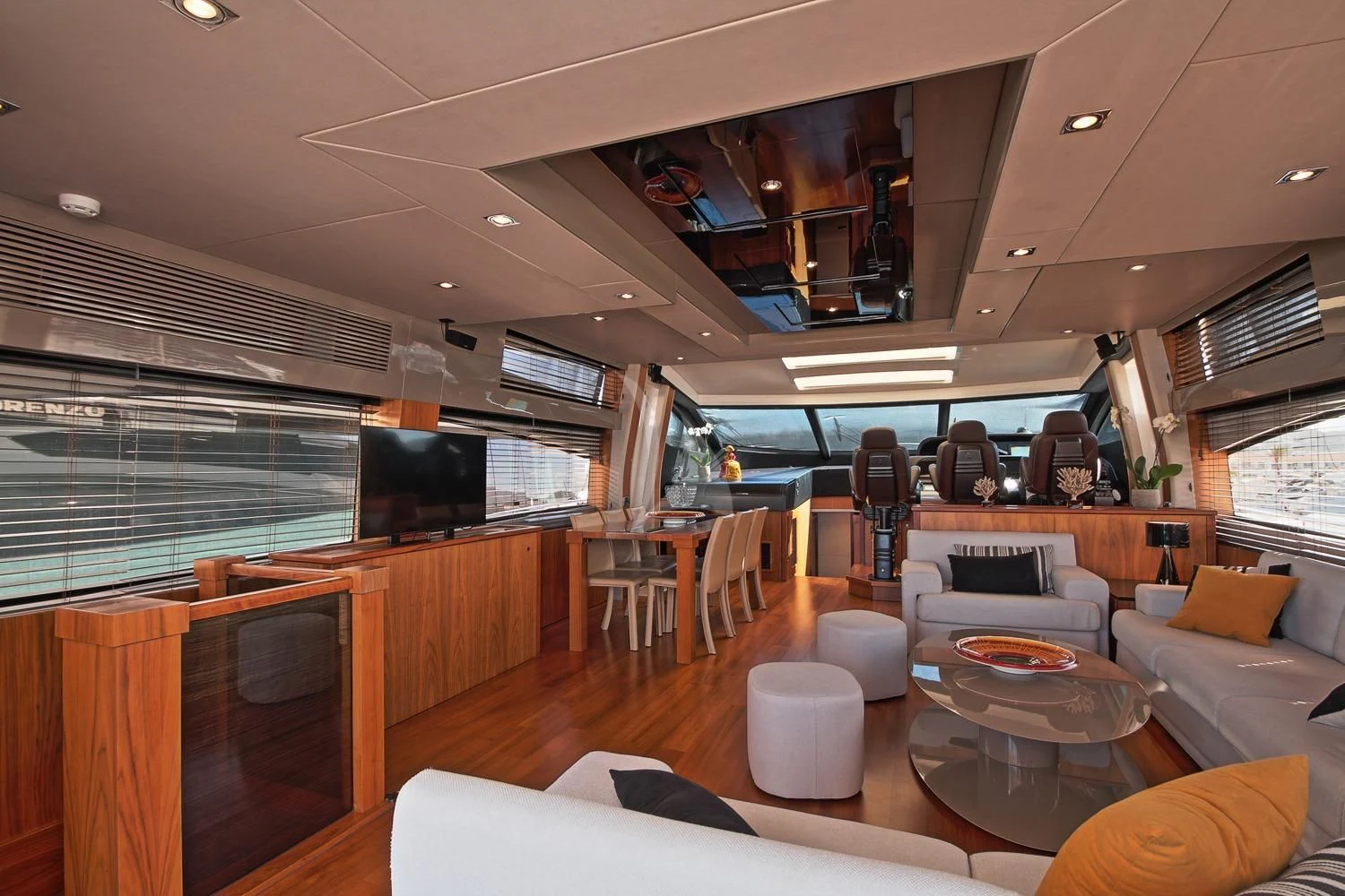 a room with a table chairs and a large window aboard BASAD Yacht for Sale