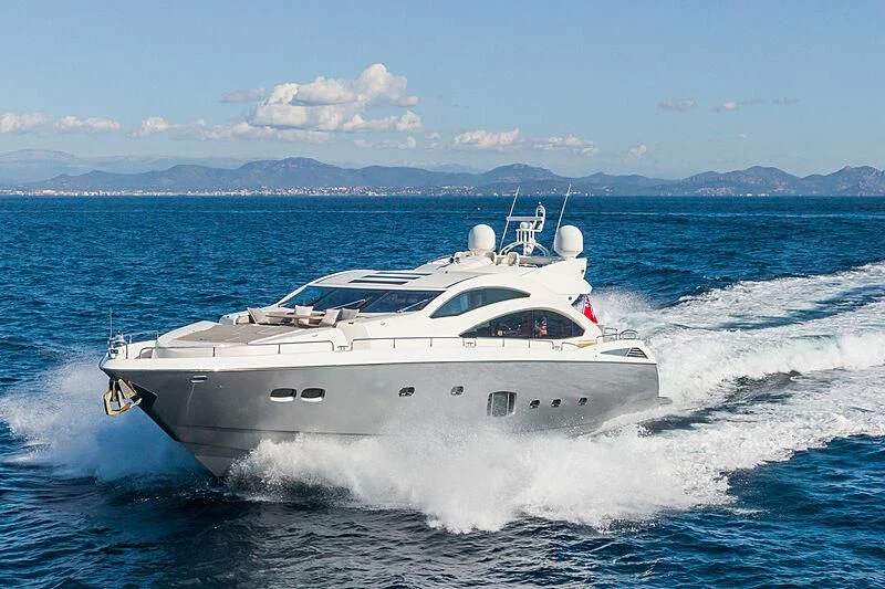 a white yacht on the water aboard BASAD Yacht for Sale