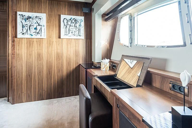 a room with a table and chairs aboard BASAD Yacht for Sale