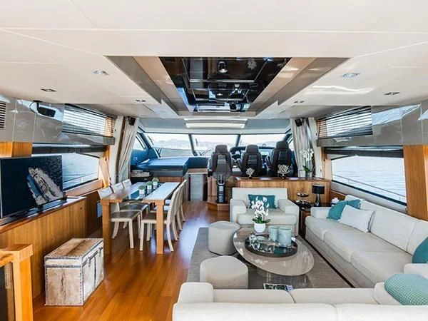a living room with a large window aboard BASAD Yacht for Sale