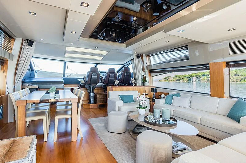 a living room with a large window aboard BASAD Yacht for Sale