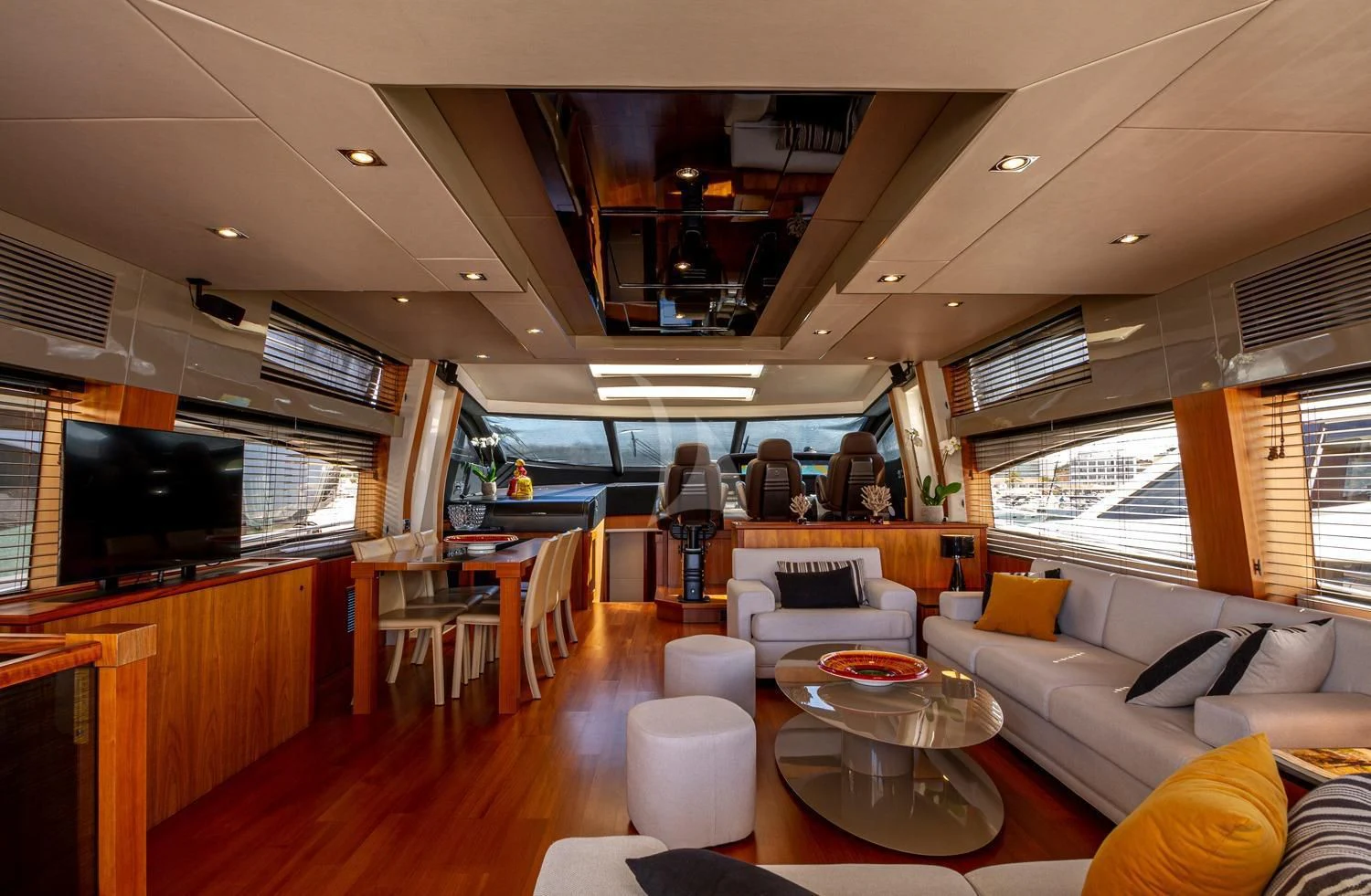 a living room with a wood floor aboard BASAD Yacht for Sale