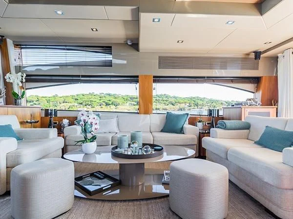 a living room with a large window aboard BASAD Yacht for Sale