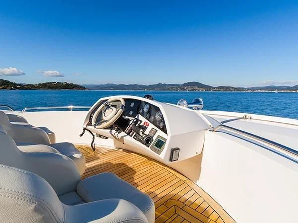 a boat with a steering wheel aboard BASAD Yacht for Sale