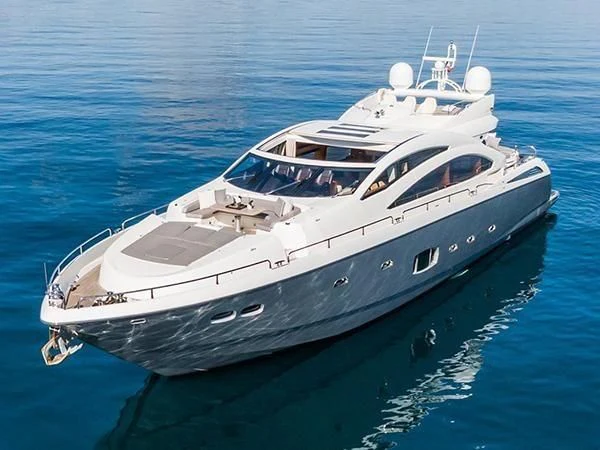 a white yacht on the water aboard BASAD Yacht for Sale