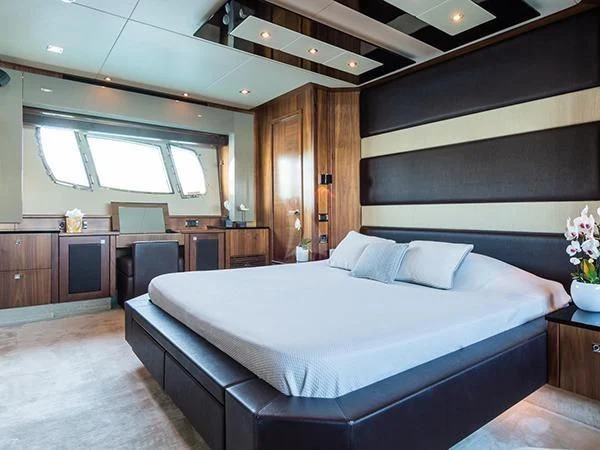 a large bed in a room aboard BASAD Yacht for Sale