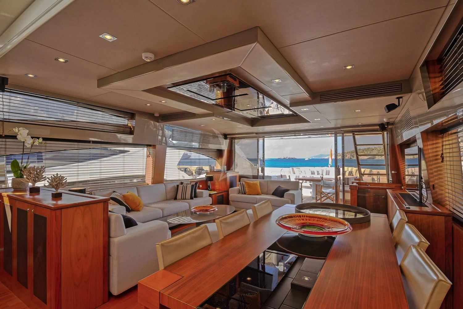 a living room with a large window aboard BASAD Yacht for Sale