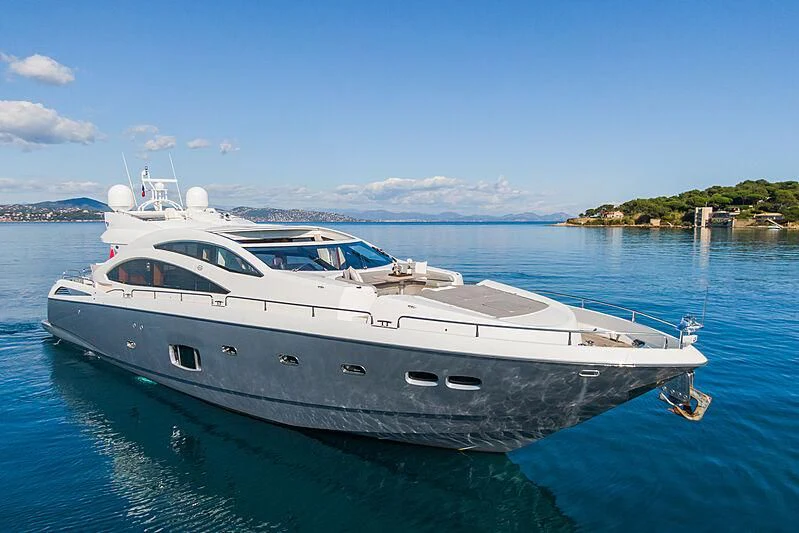 a white yacht in the water aboard BASAD Yacht for Sale