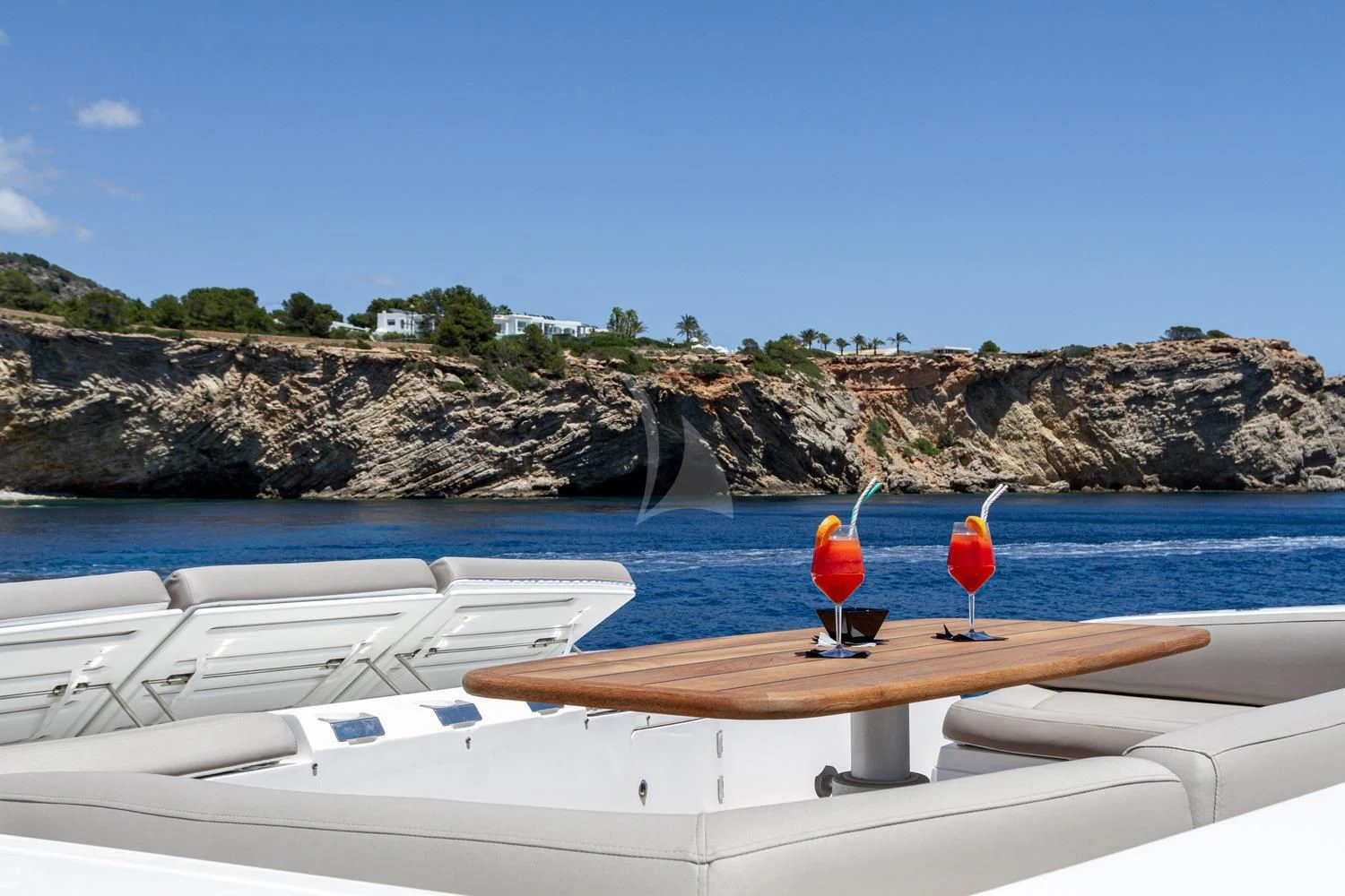 a couple of colorful birds on a boat on the water aboard BASAD Yacht for Sale