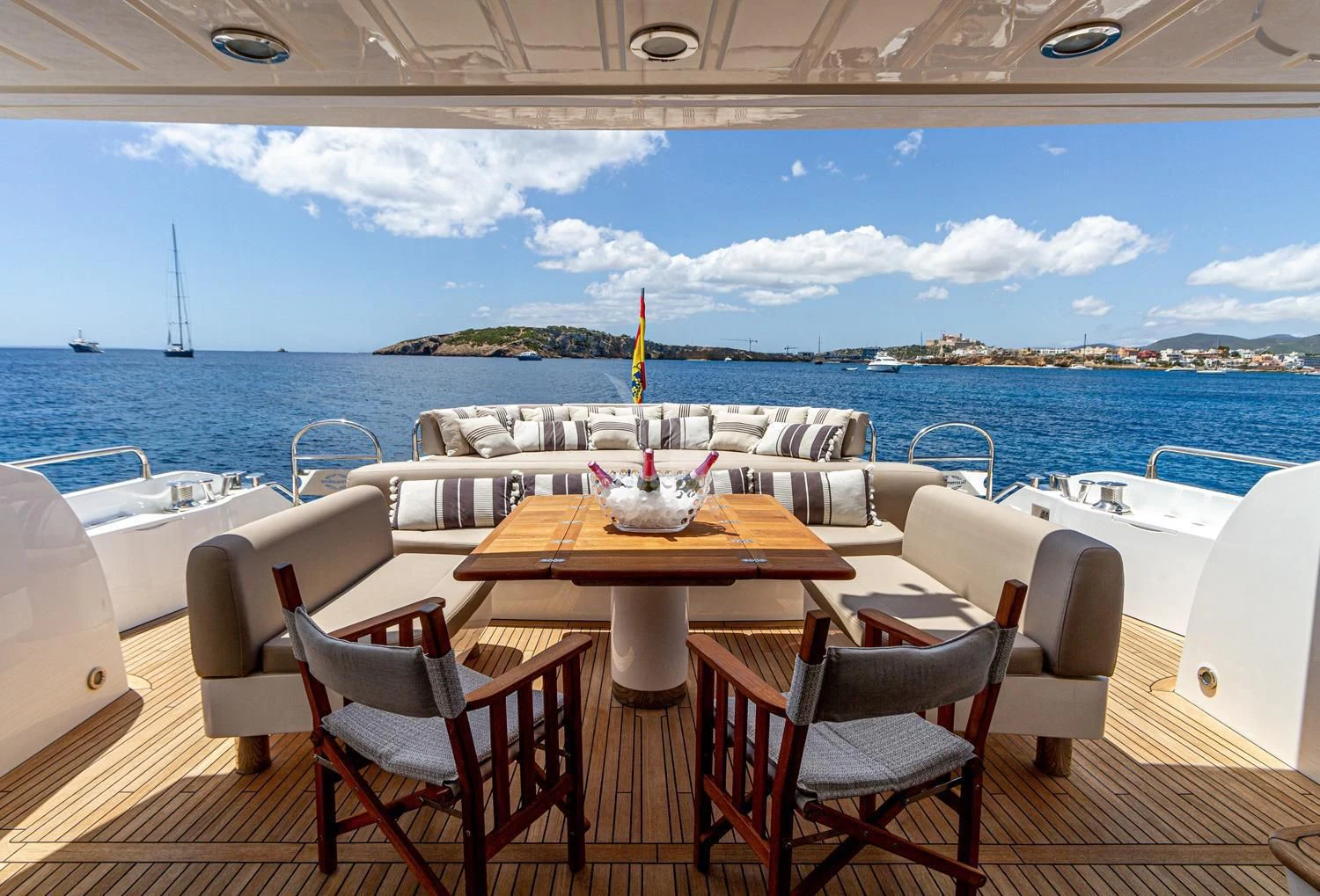 a table and chairs on a boat aboard BASAD Yacht for Sale