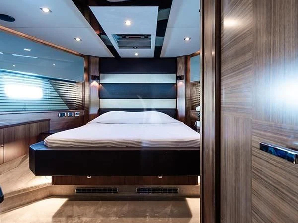 a room with a bed and a window aboard BASAD Yacht for Sale