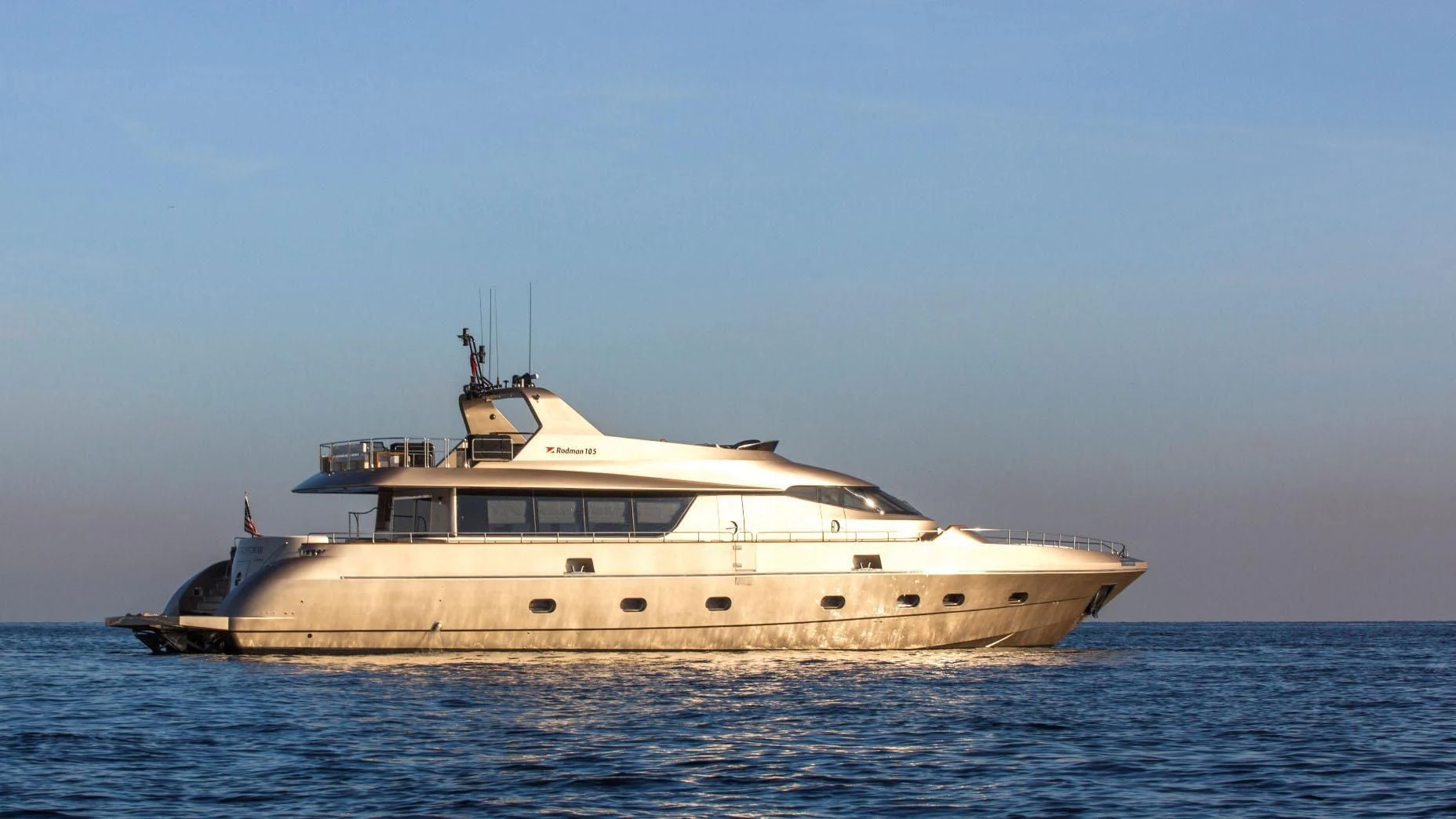 a large boat in the water aboard NIRVANA Yacht for Sale