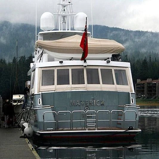 a boat docked at a pier aboard MAVERICK Yacht for Sale