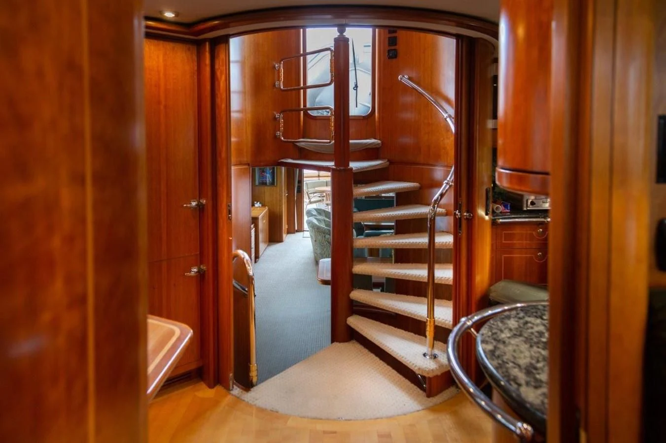 a room with a staircase and a door aboard MAVERICK Yacht for Sale