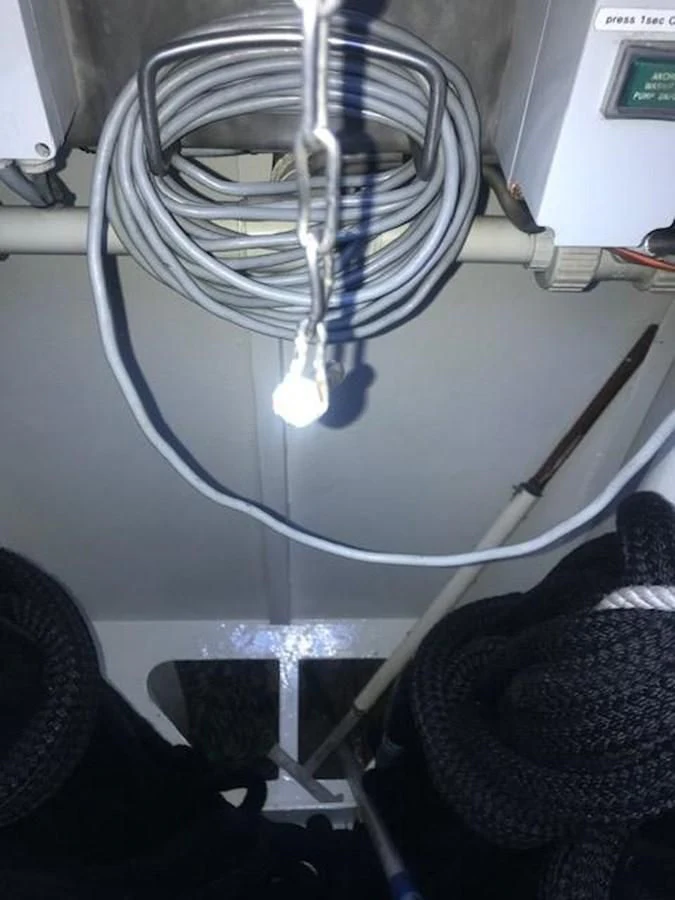 a white fan on a white wall aboard MAVERICK Yacht for Sale