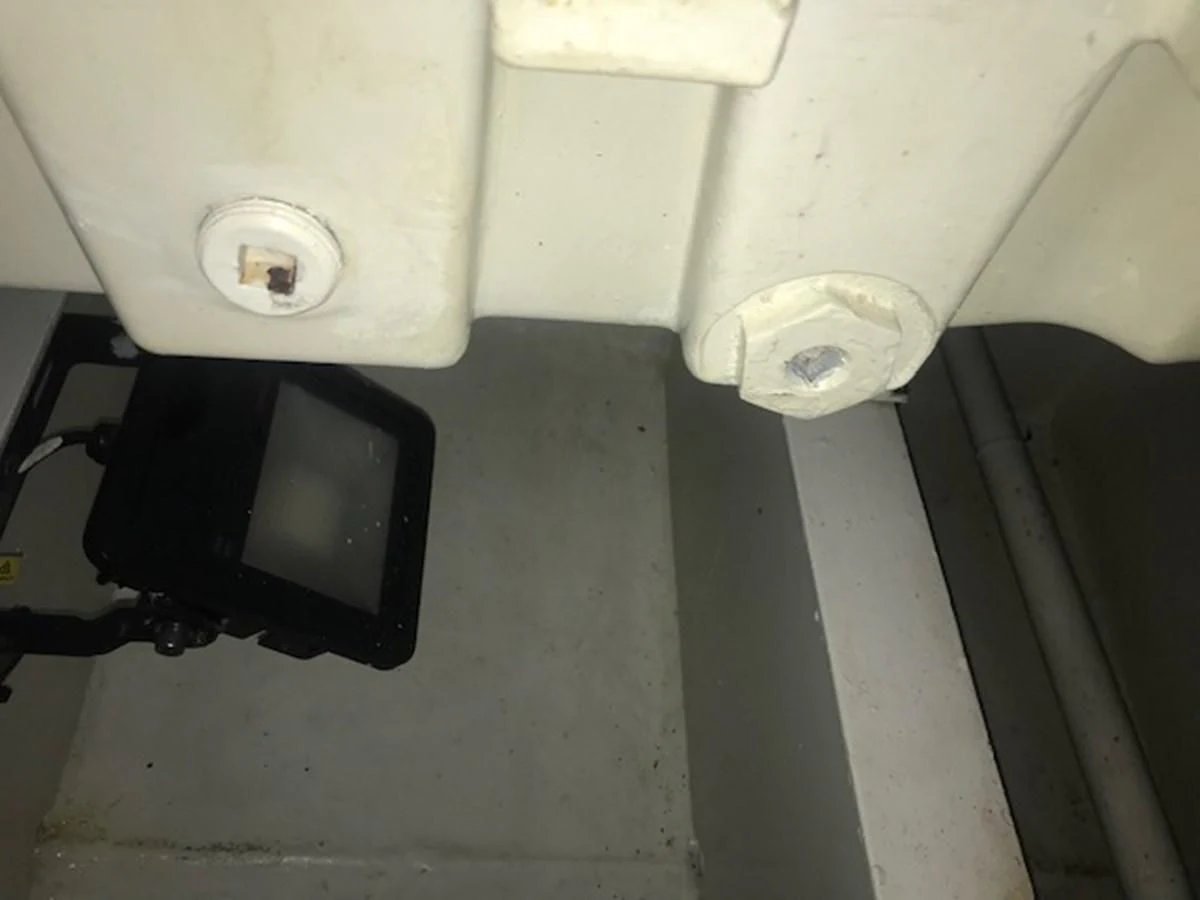 a black object on a white surface aboard MAVERICK Yacht for Sale