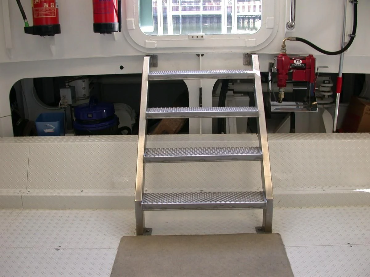 a white ladder in a room aboard MAVERICK Yacht for Sale