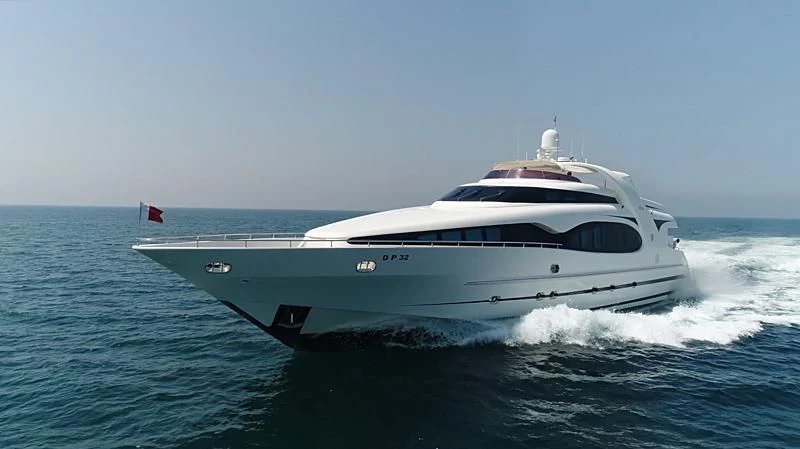 a white yacht on the water aboard LA VIE EN ROSE Yacht for Sale
