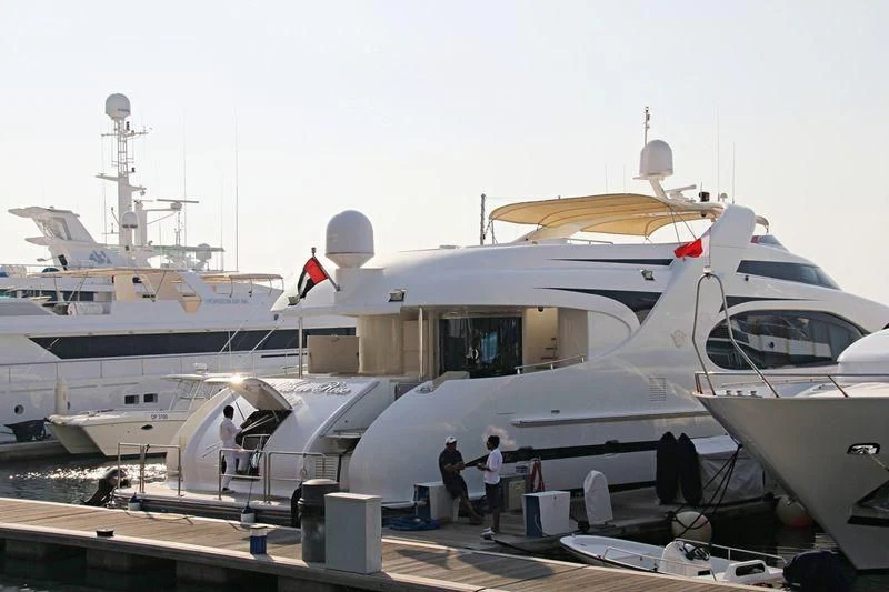 a group of people boarding a plane aboard LA VIE EN ROSE Yacht for Sale