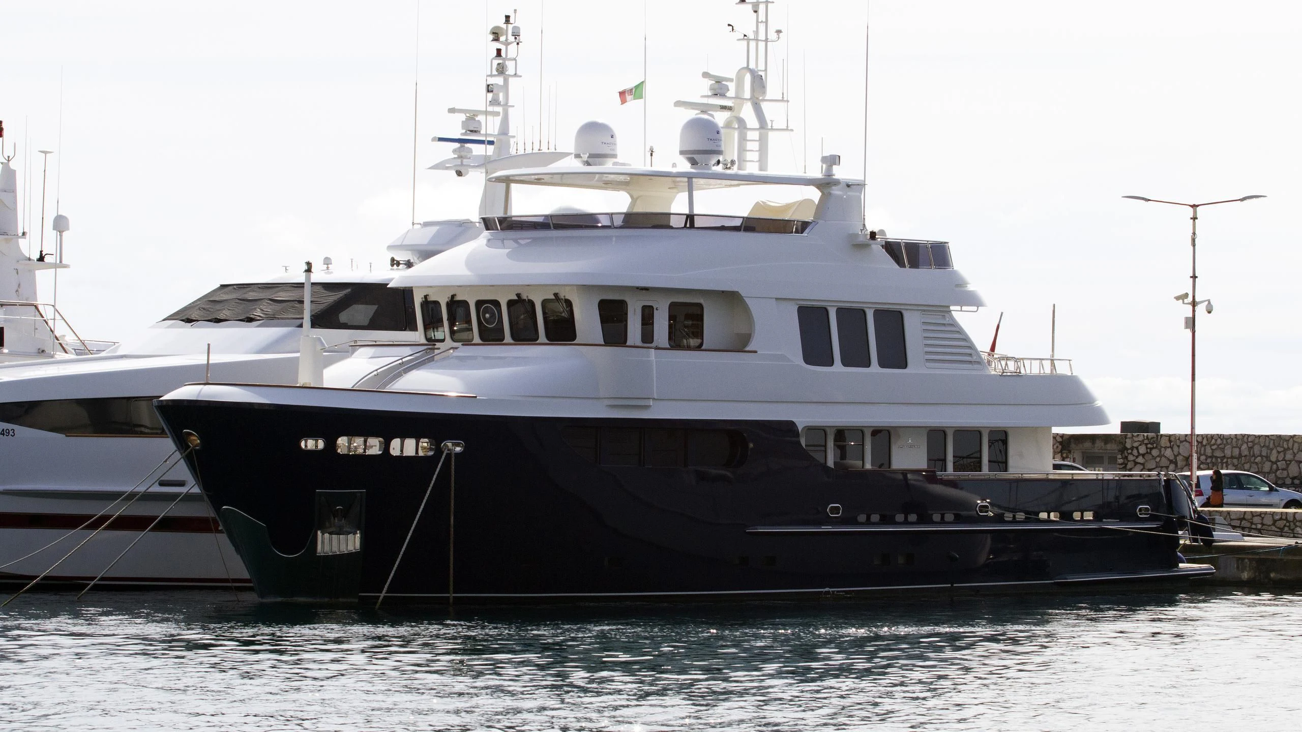 a large boat in the water aboard SMILING T Yacht for Sale