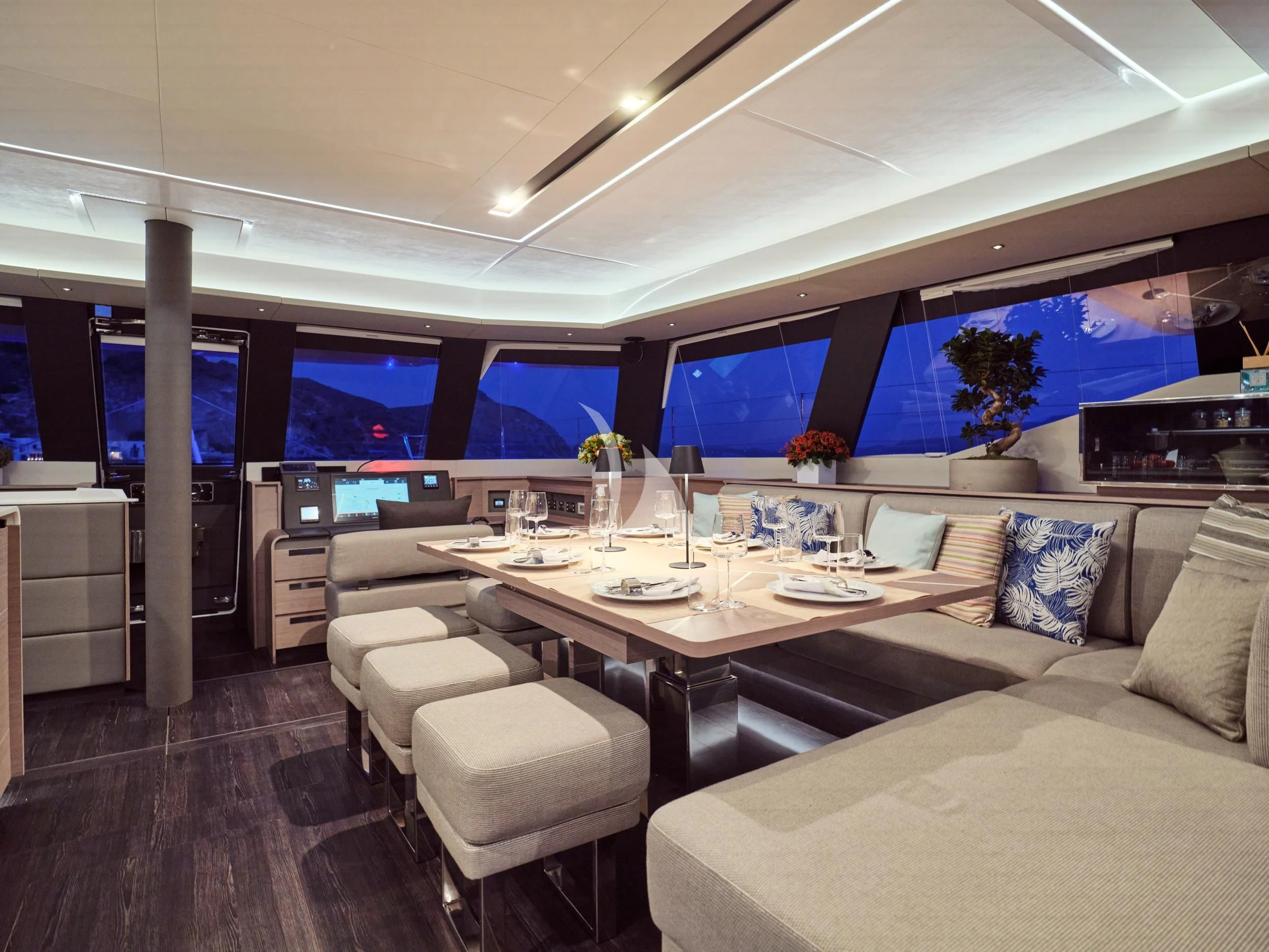 a room with a couch and a table aboard APHAEA Yacht for Charter
