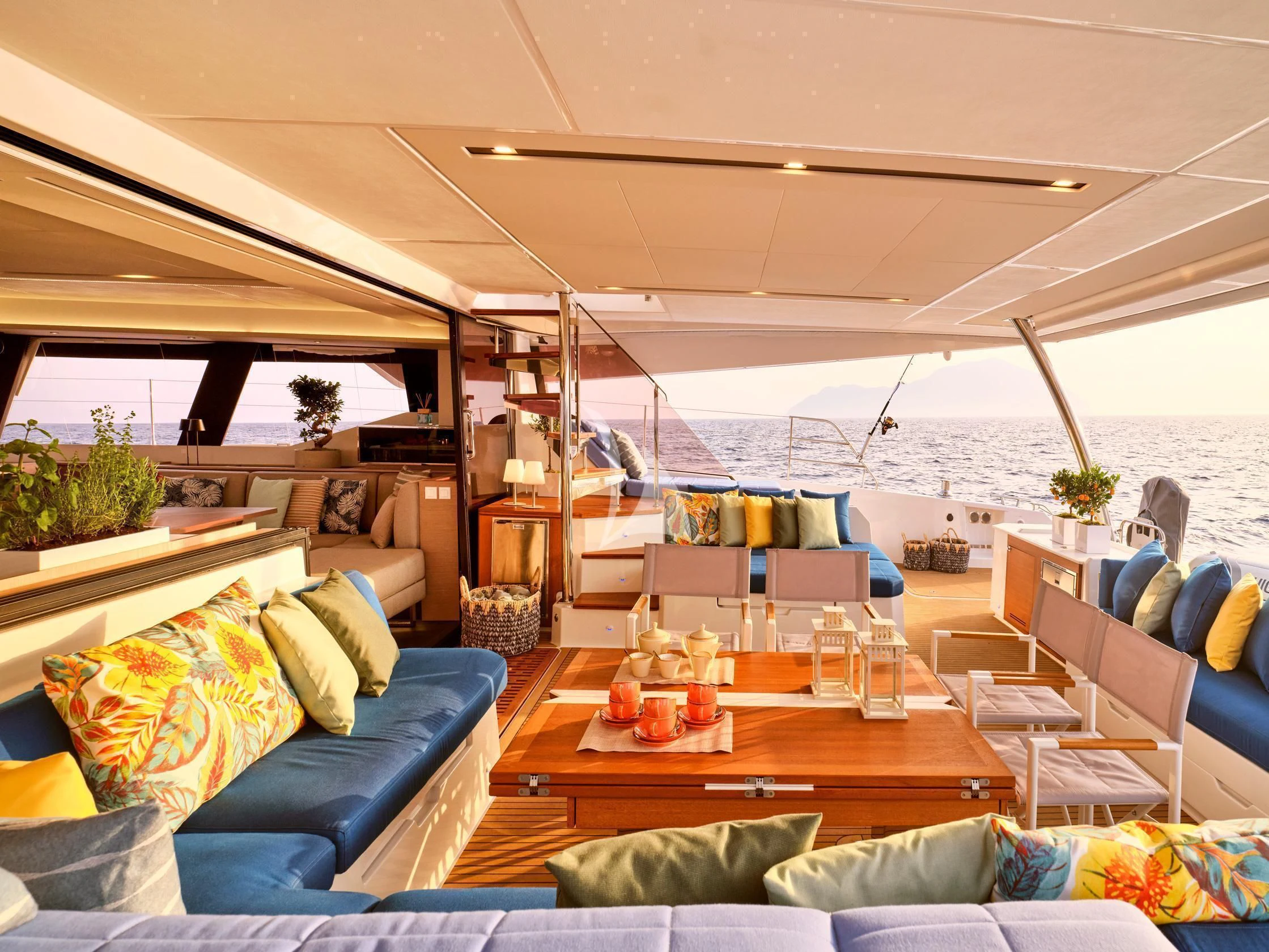 a living room with a large window aboard APHAEA Yacht for Charter