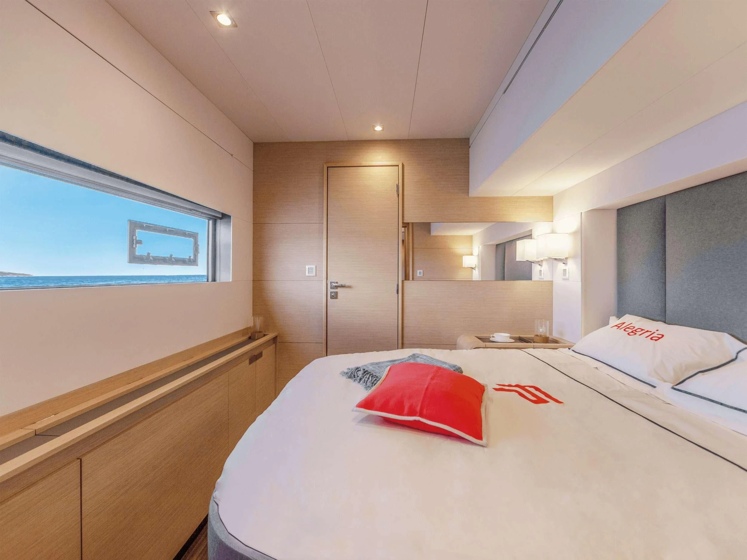 a hotel room with a bed aboard APHAEA Yacht for Charter