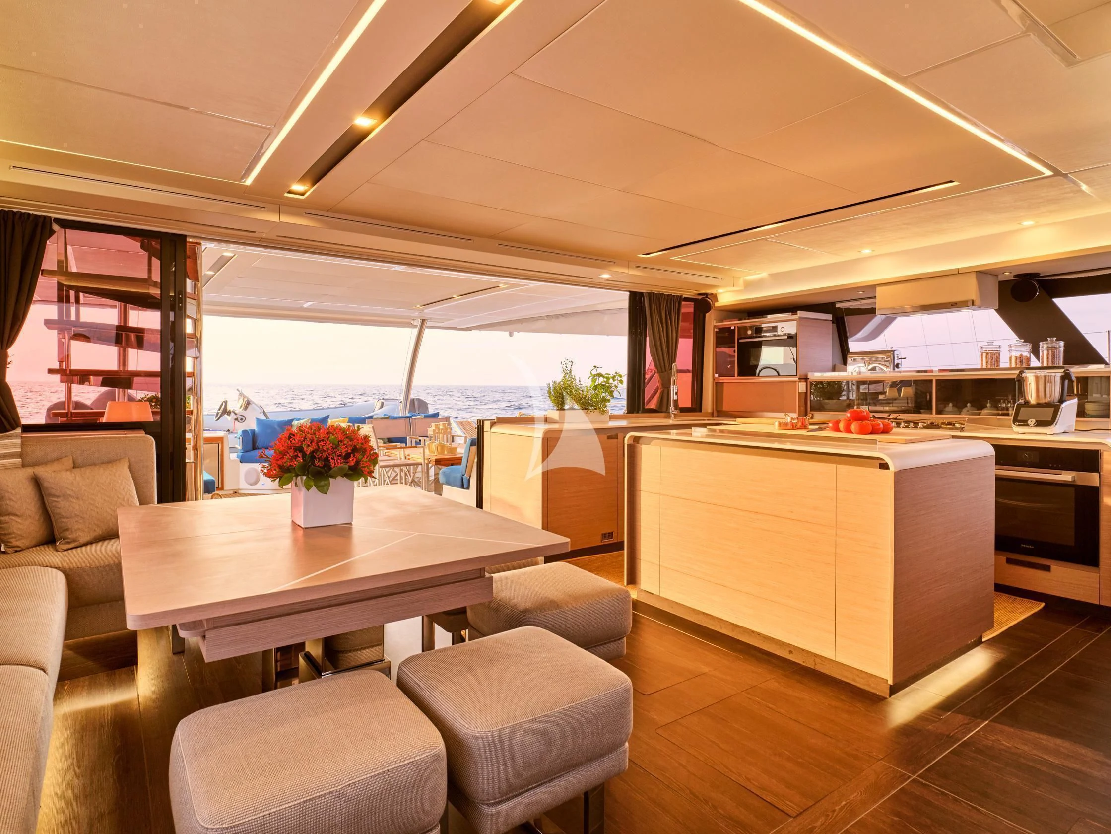 a room with a table and chairs aboard APHAEA Yacht for Charter