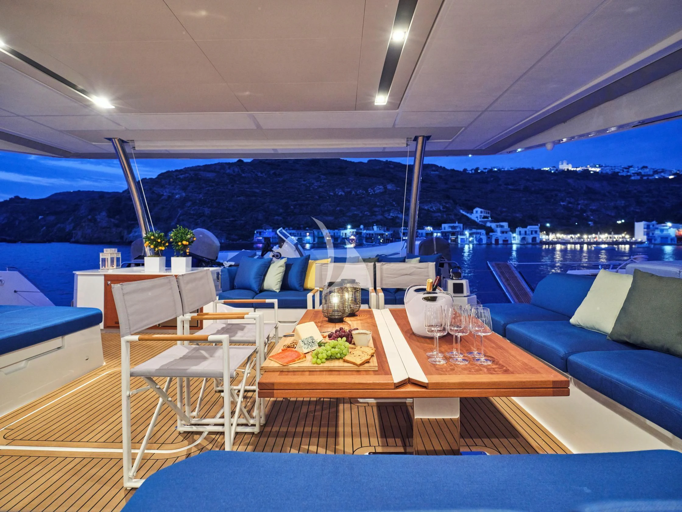 a room with a table and chairs aboard APHAEA Yacht for Charter