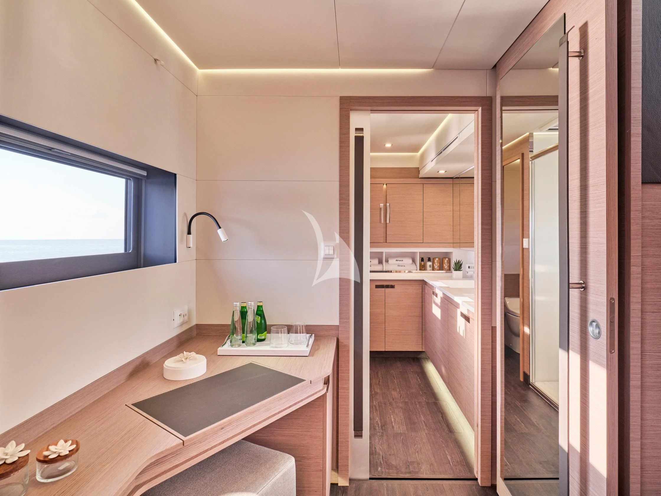 a kitchen with a countertop sink and cabinets aboard APHAEA Yacht for Charter