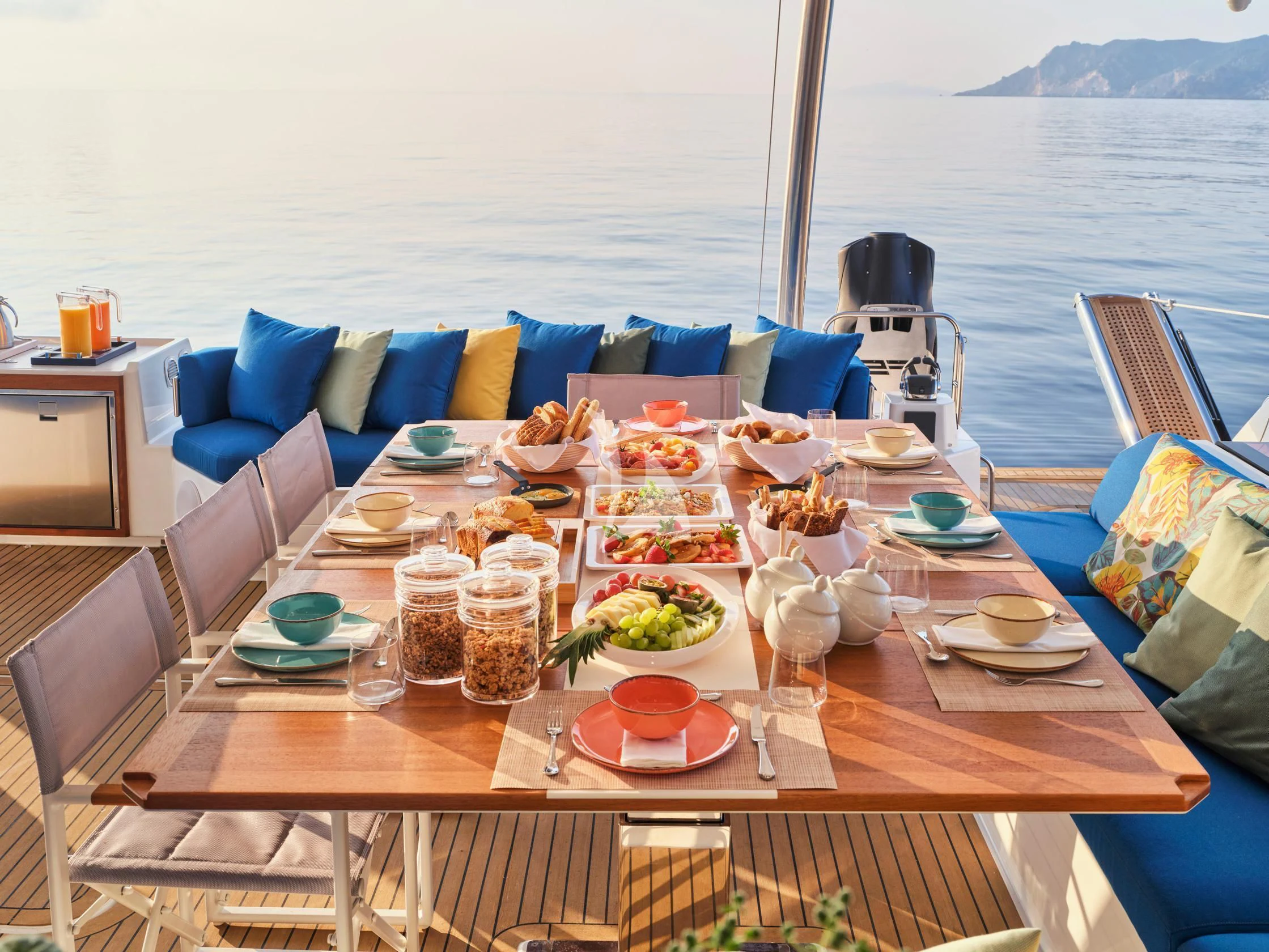 a table with food on it aboard APHAEA Yacht for Charter