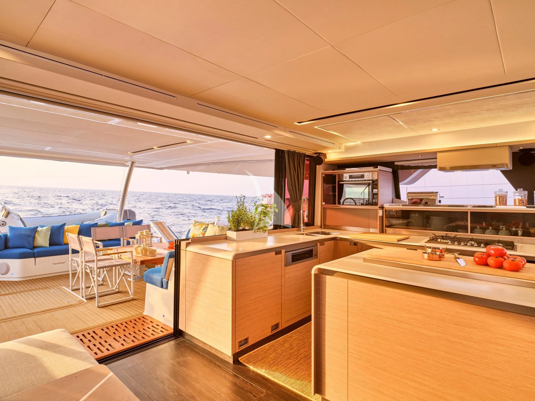 a kitchen with a view of the ocean aboard APHAEA Yacht for Charter
