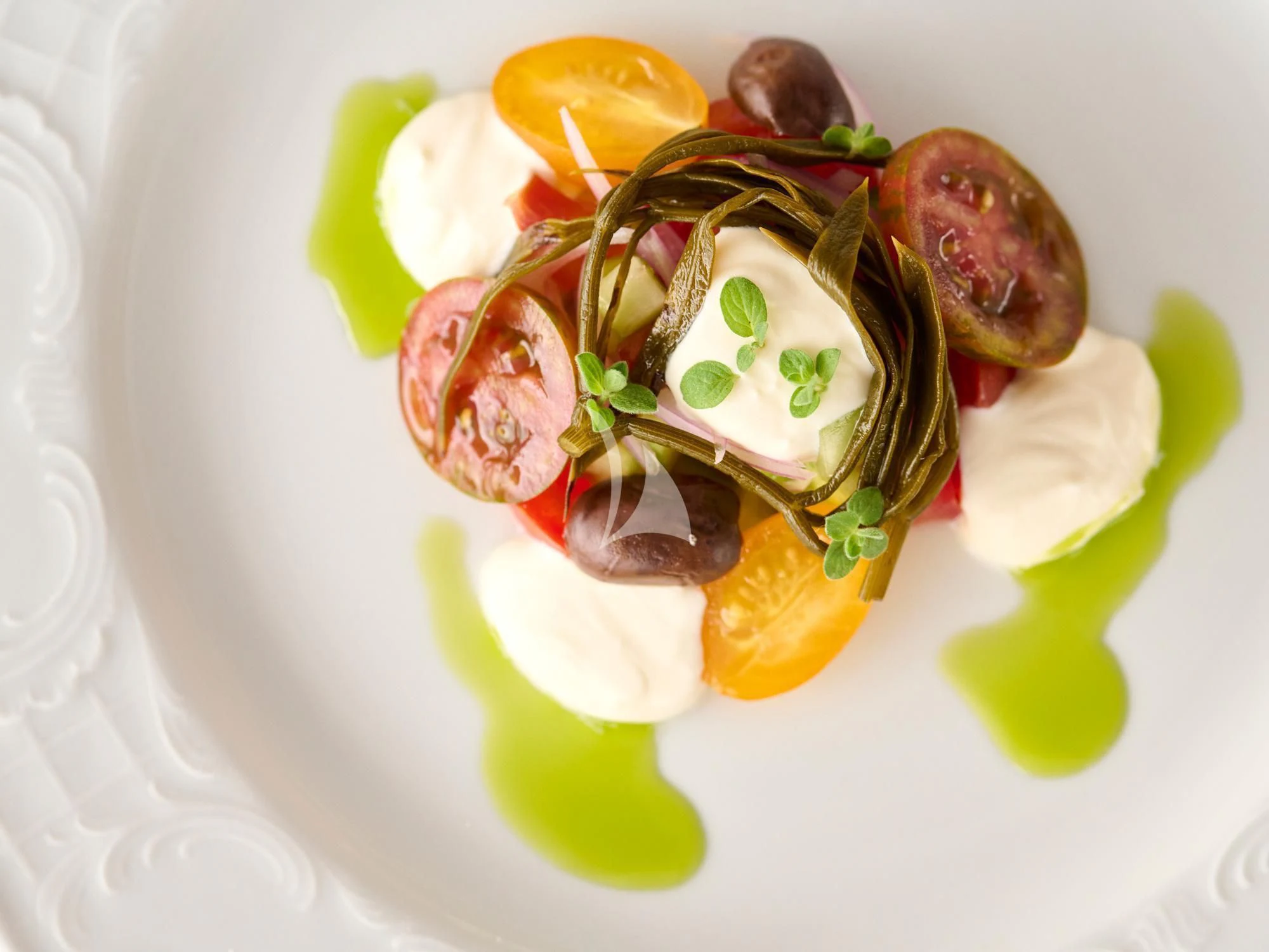 a plate of food aboard APHAEA Yacht for Charter