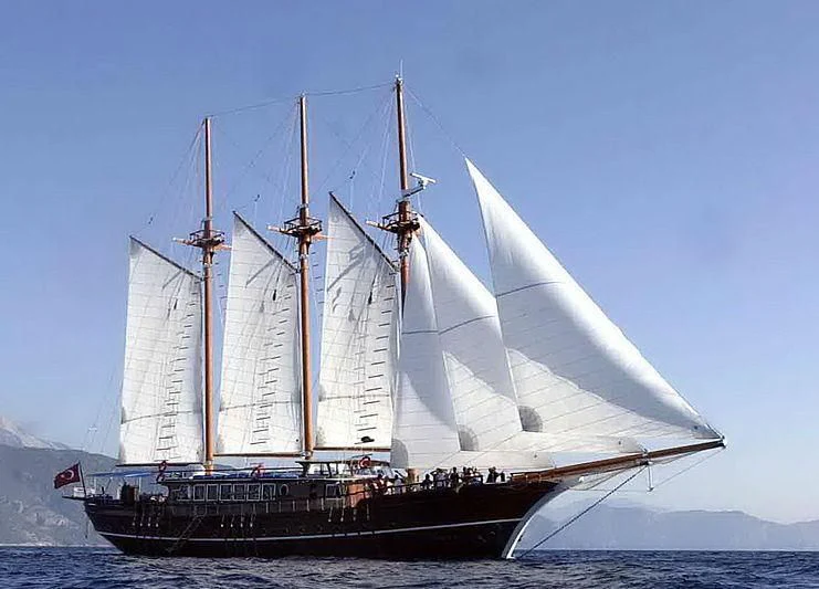 a large ship in the water aboard BAHRIYELI C Yacht for Sale