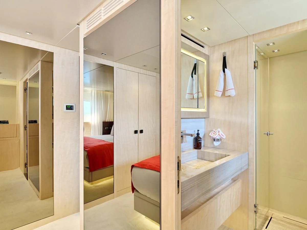 a bathroom with a tub and a sink aboard RARE DIAMOND Yacht for Sale