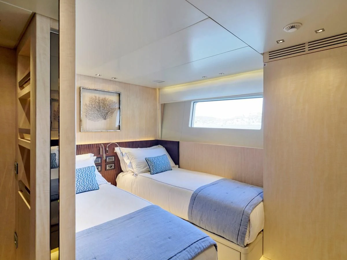 a room with two beds aboard RARE DIAMOND Yacht for Sale