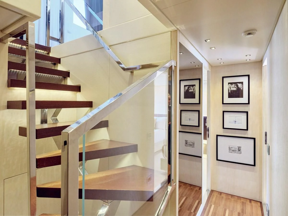 a staircase in a house aboard RARE DIAMOND Yacht for Sale