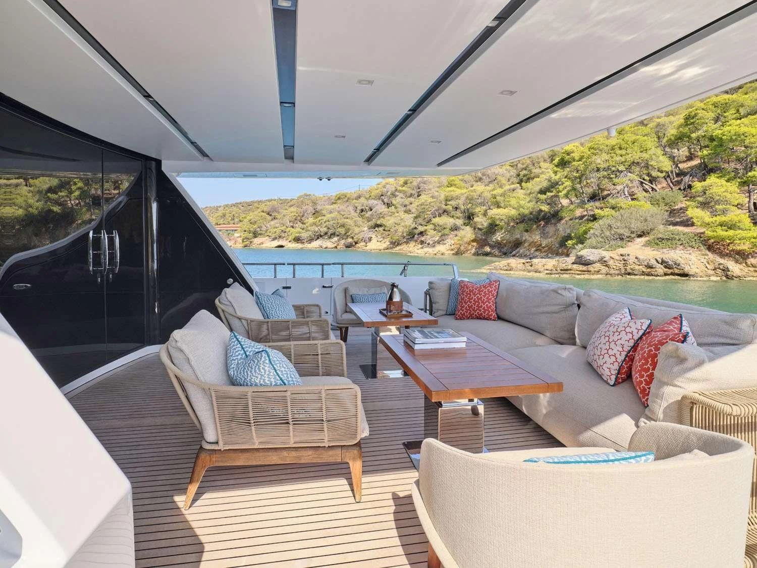 a living room with a large window aboard RARE DIAMOND Yacht for Sale