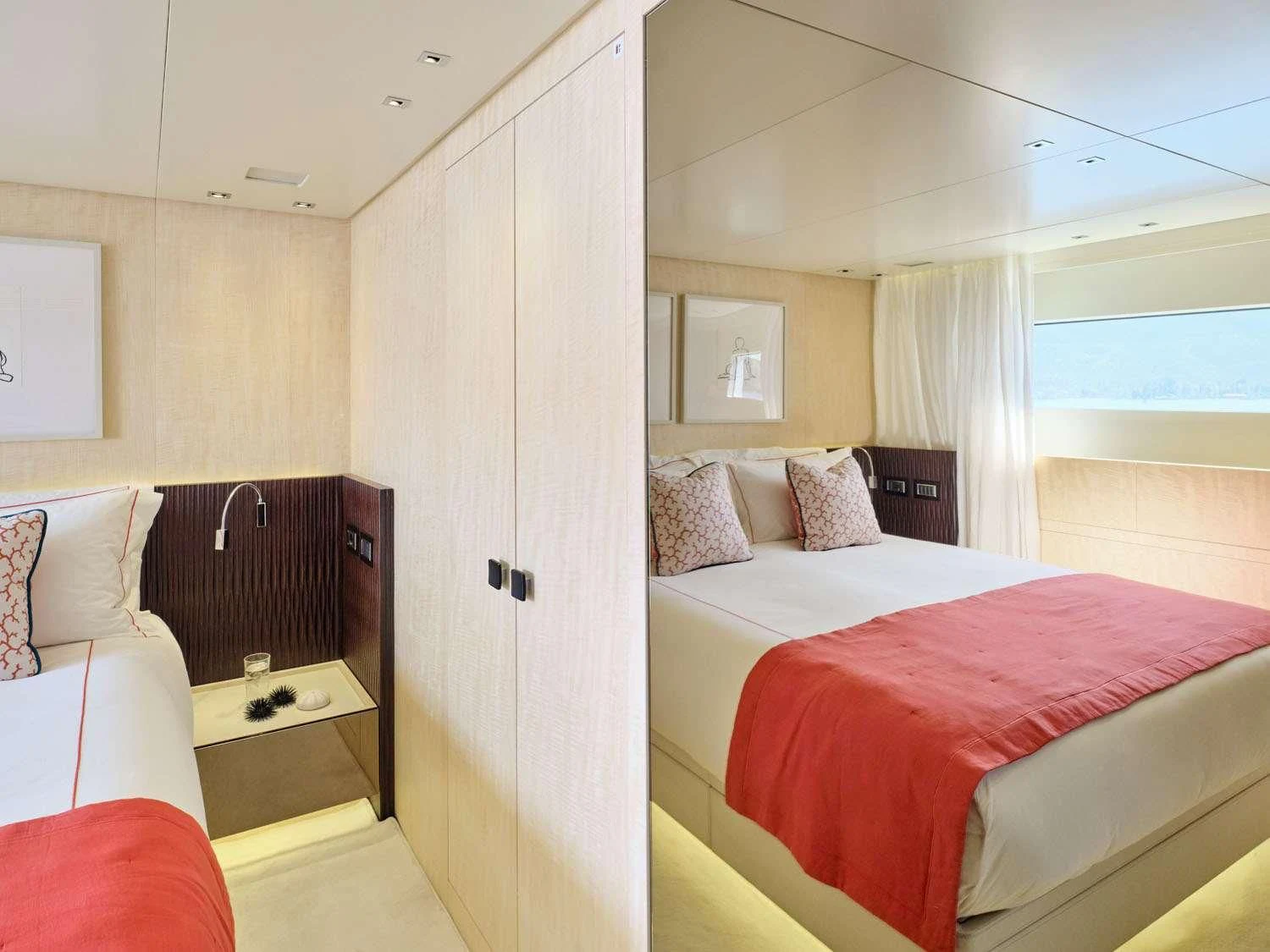 a bedroom with a bed and a desk aboard RARE DIAMOND Yacht for Sale