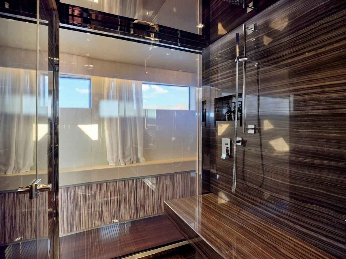 a room with glass doors aboard RARE DIAMOND Yacht for Sale