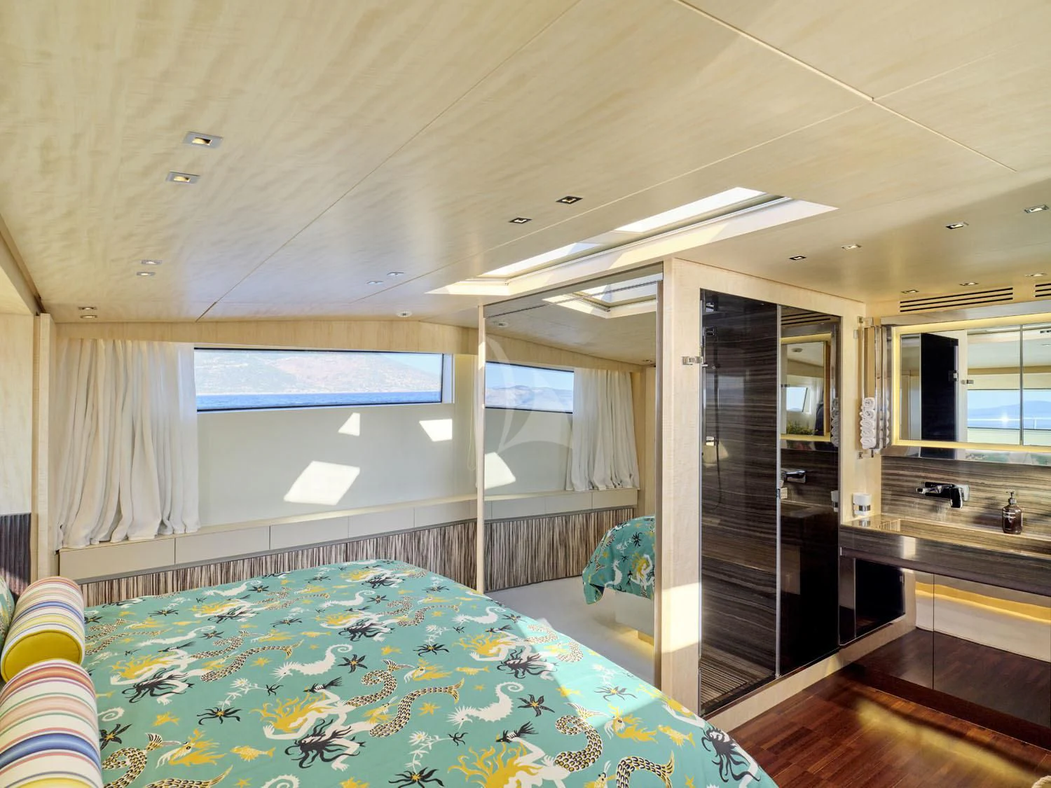 a large bathroom with a large jacuzzi aboard RARE DIAMOND Yacht for Sale