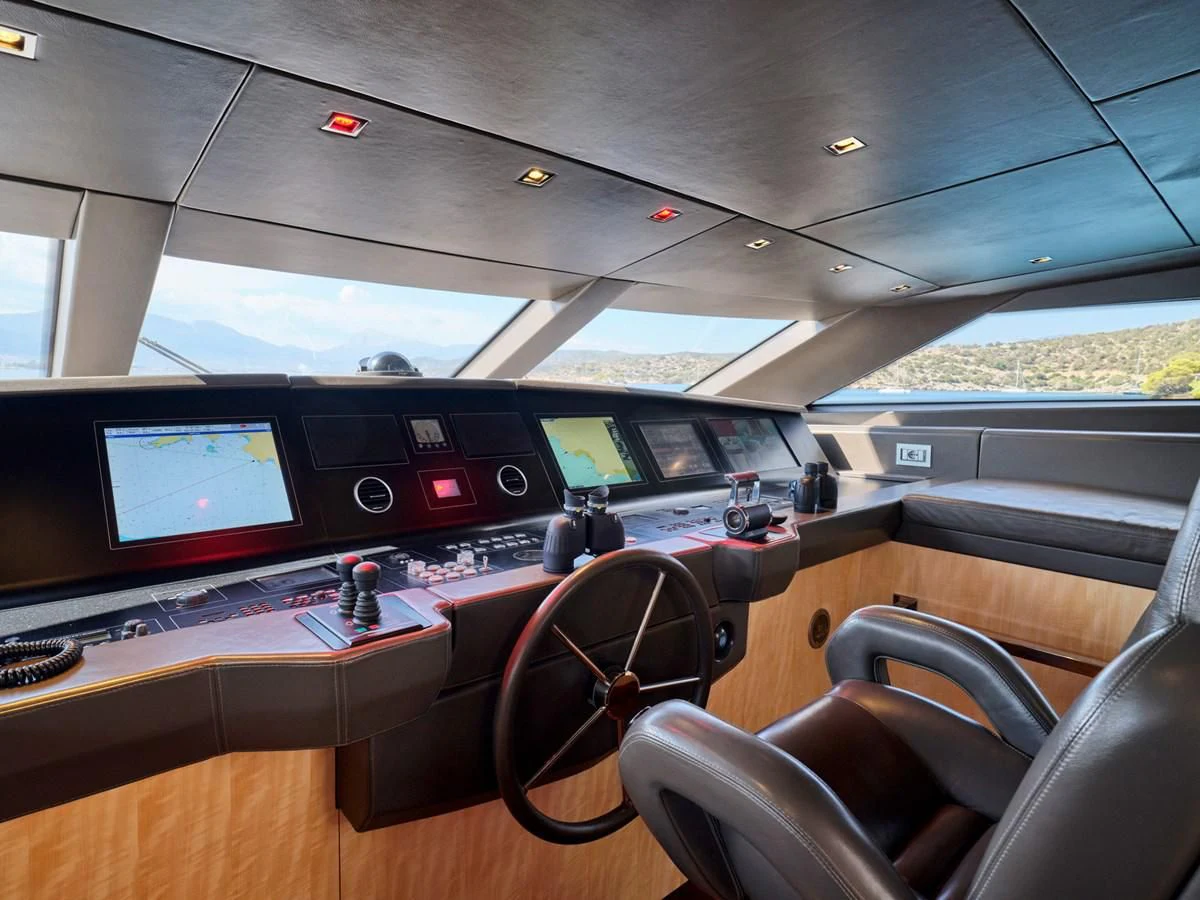 inside of a vehicle with a large screen and a few screens aboard RARE DIAMOND Yacht for Sale