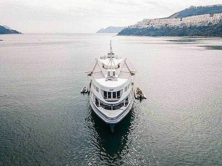 a couple of boats in the water aboard DOT Yacht for Sale