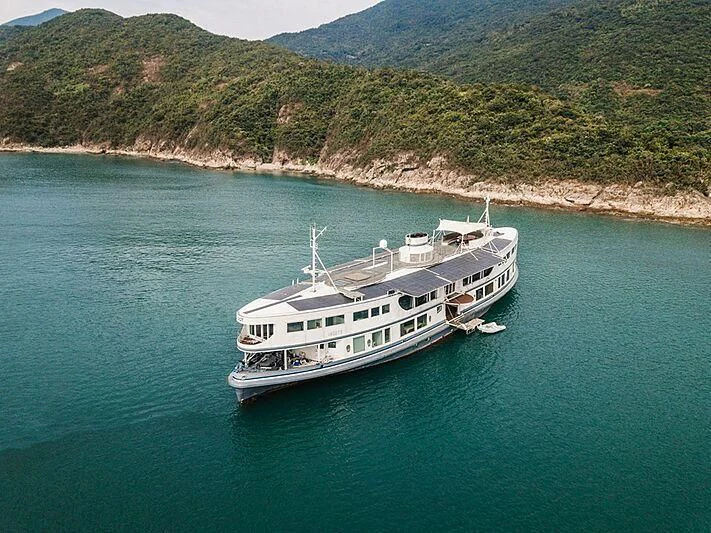 a boat on the water aboard DOT Yacht for Sale